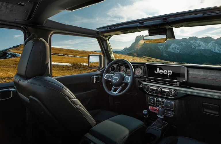 The steering wheel of the 2024 Jeep Wrangler is shown.